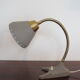 Scandinavian articulated lamp EWÅ for table or wall mounting.