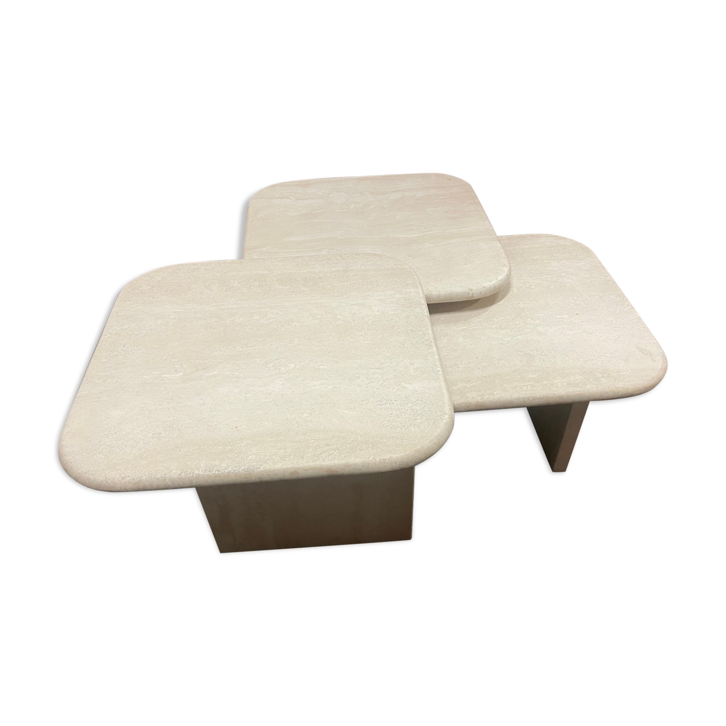 Modular pull-out coffee tables in travertine