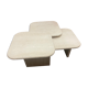 Modular pull-out coffee tables in travertine