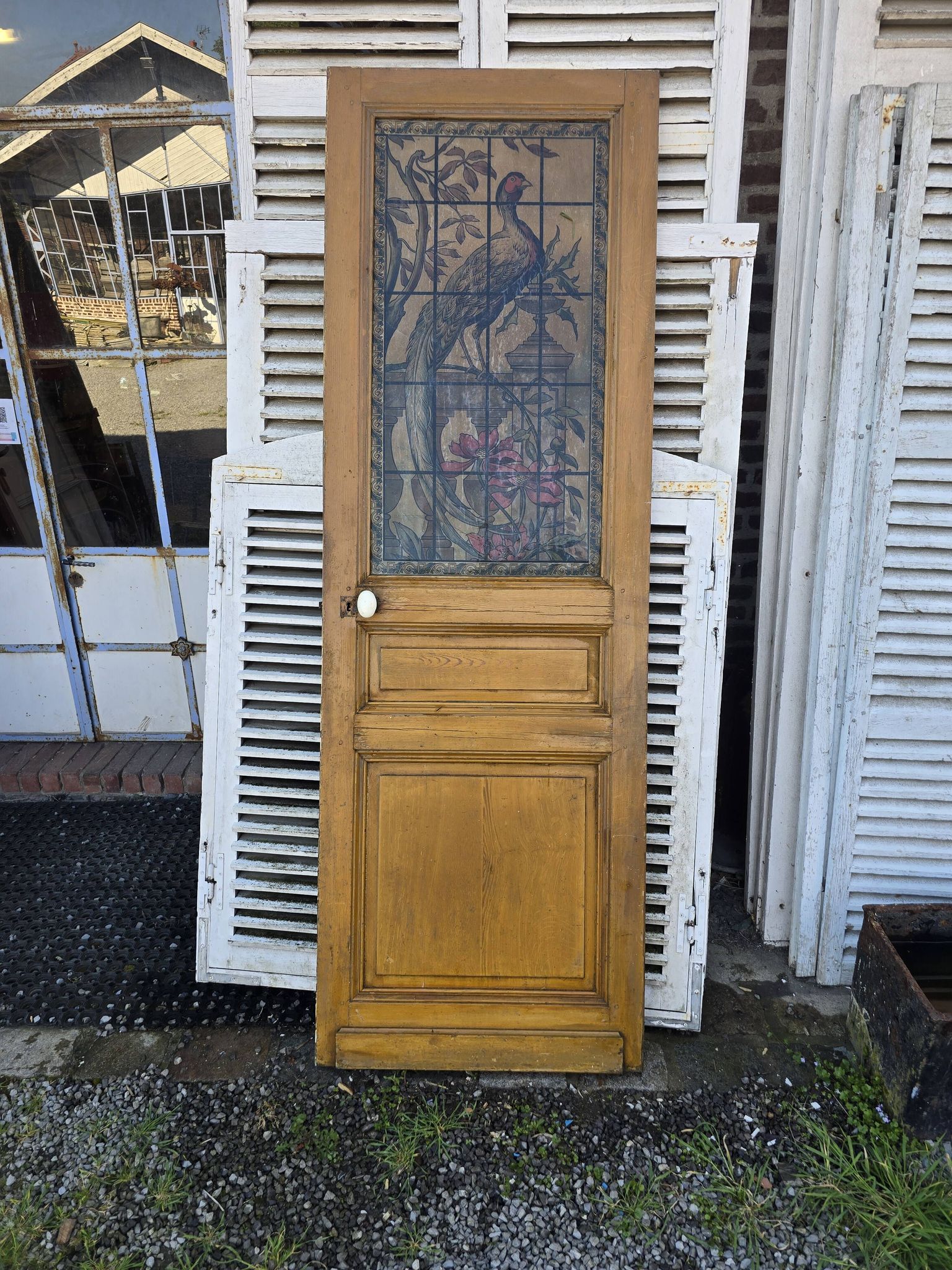 old door with decorated window