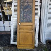 old door with decorated window