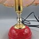 Vintage pink glass globe lamp with brass details and pink base