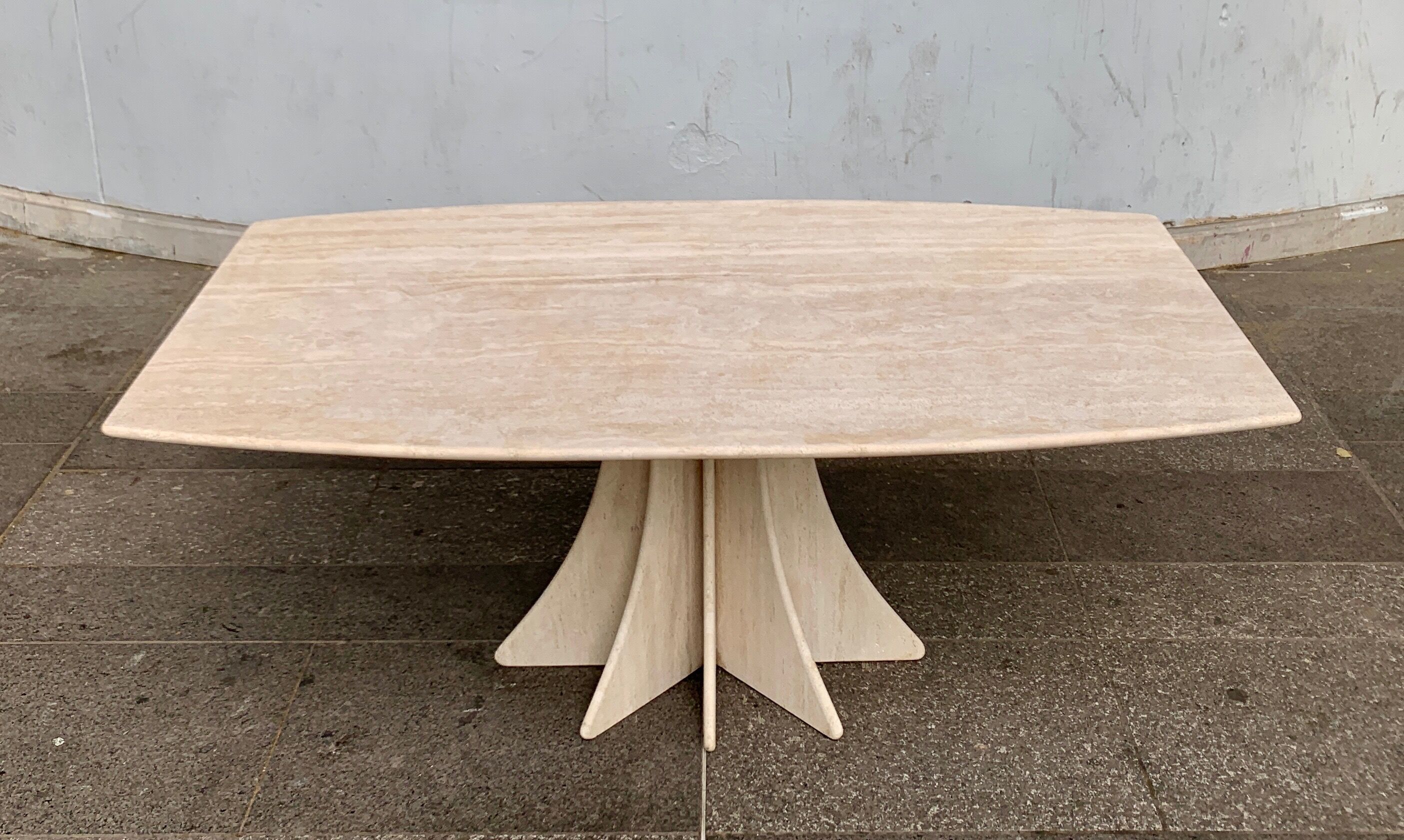 Travertine dining table by Claude Berraldacci with 8-sided stand