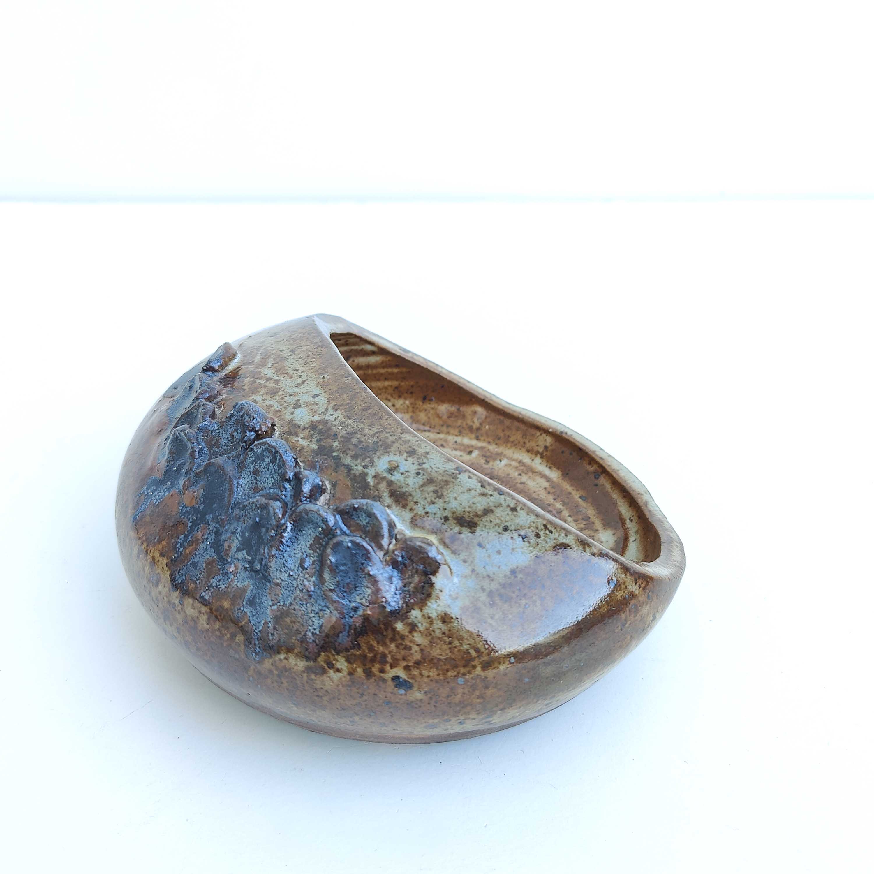 Empty vintage stoneware pocket