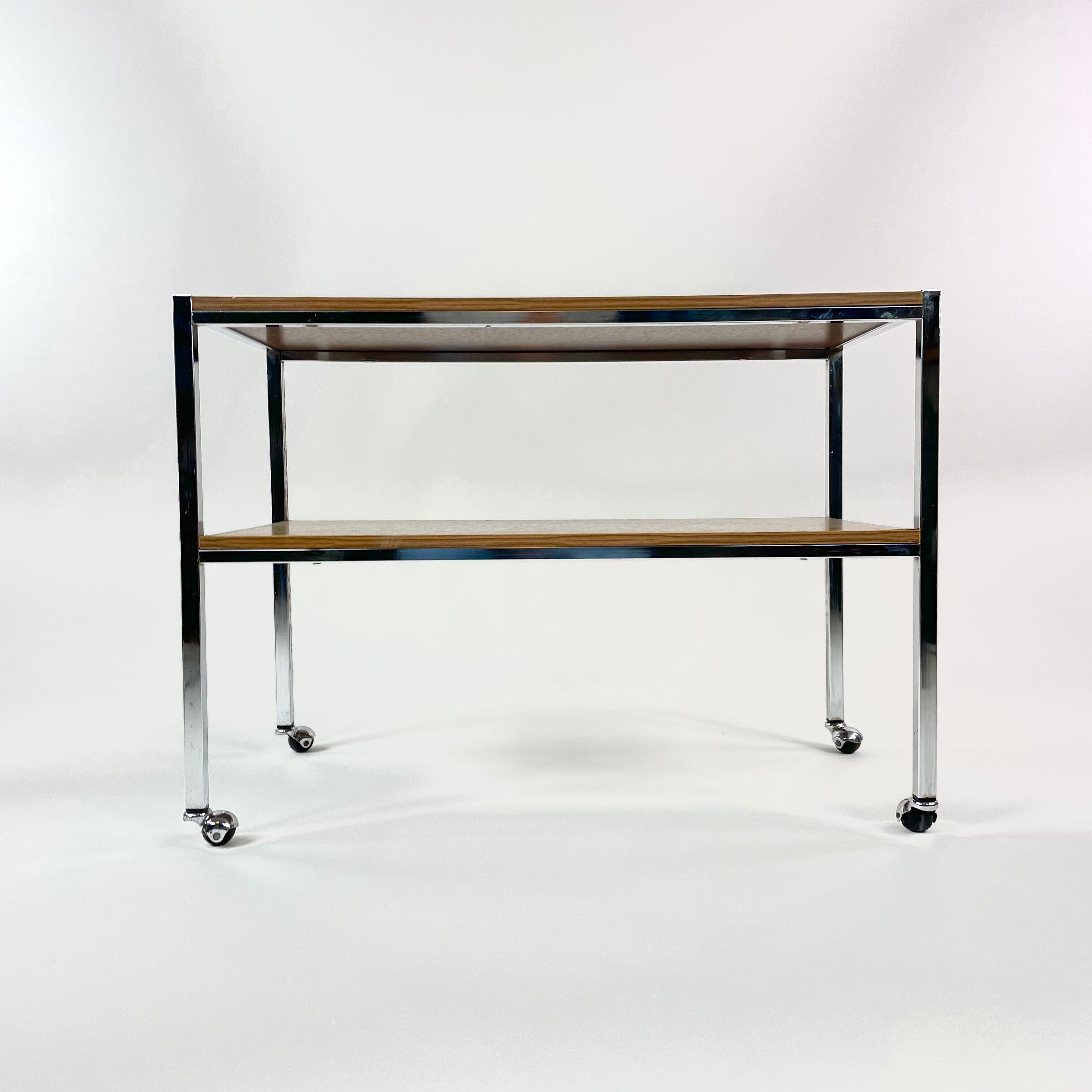 Table on wheels, laminate top and metal Eiffel legs, circa 1950