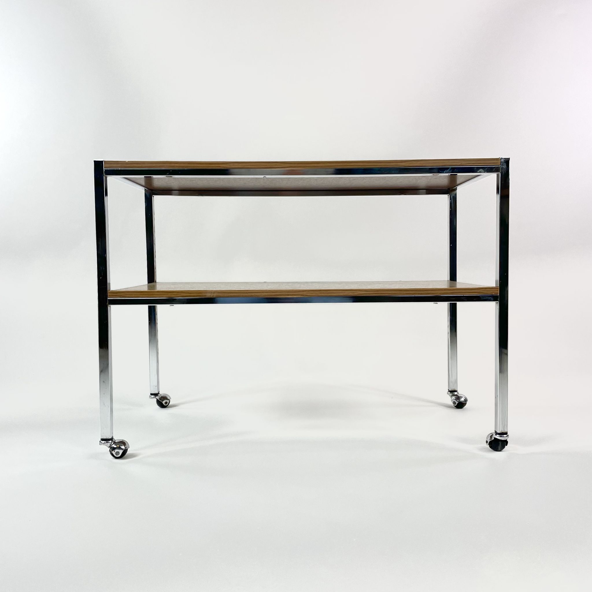 Table on wheels, laminate top and metal Eiffel legs, circa 1950