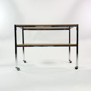 Table on wheels, laminate top and metal Eiffel legs, circa 1950
