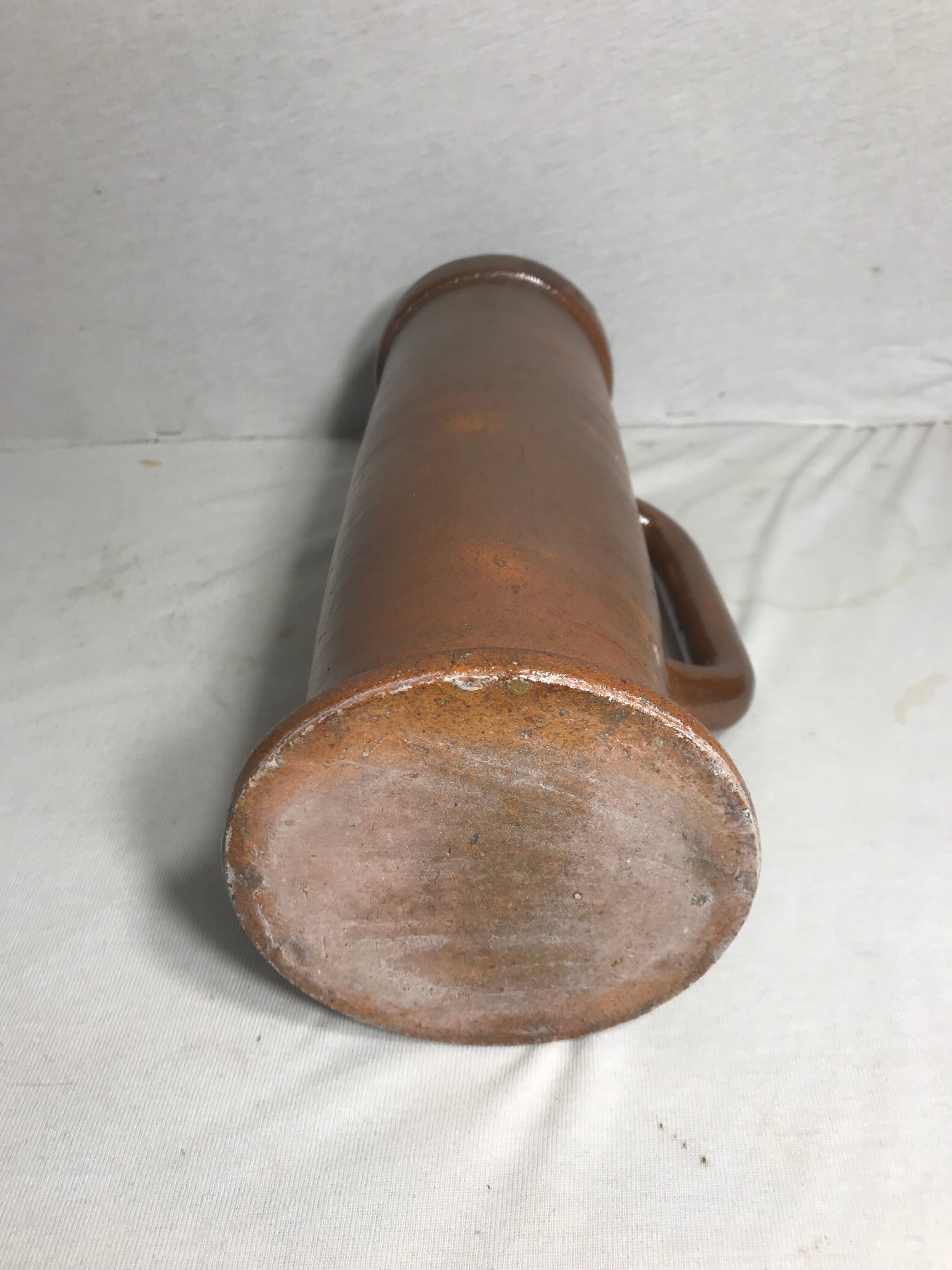 Old pitcher top in brown sandstone 70s