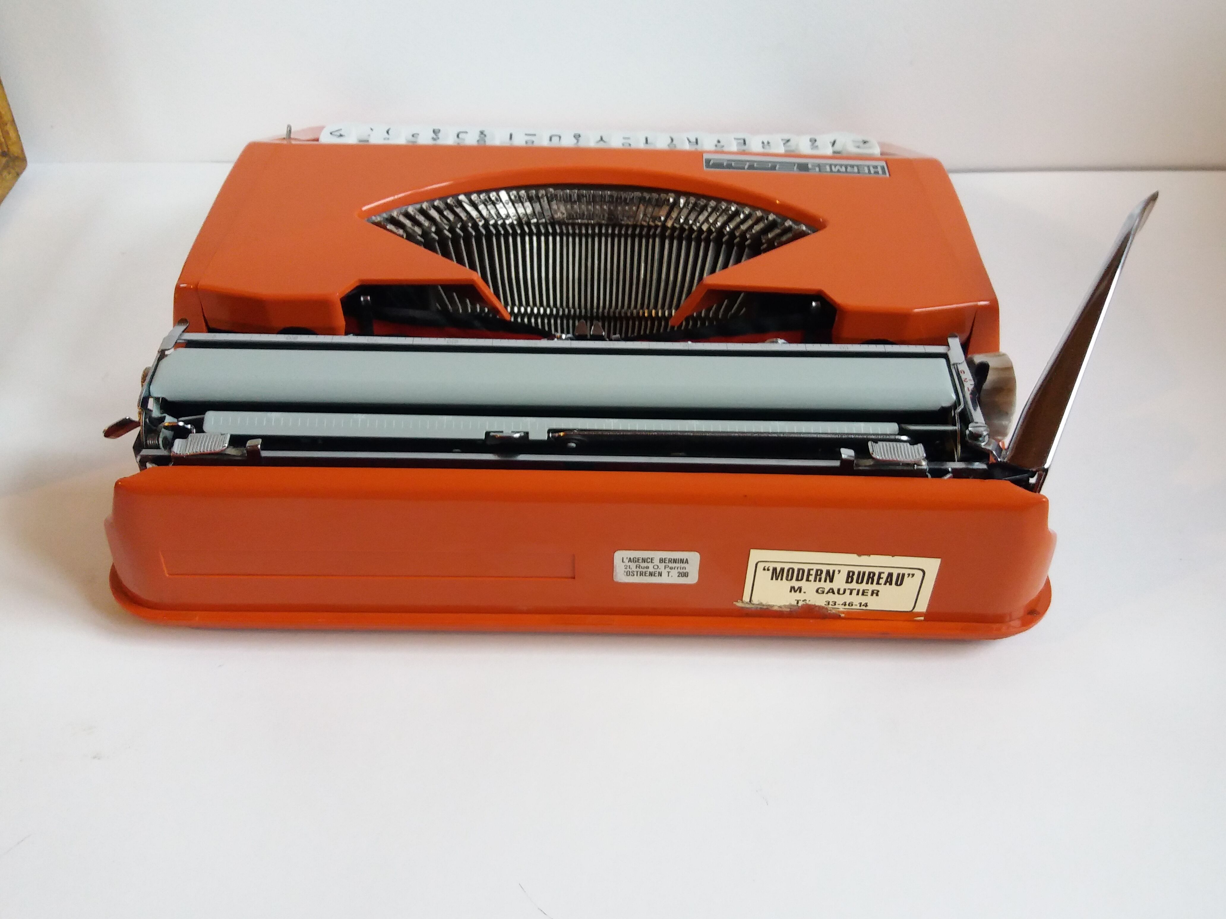 Hermes Baby orange typewriter