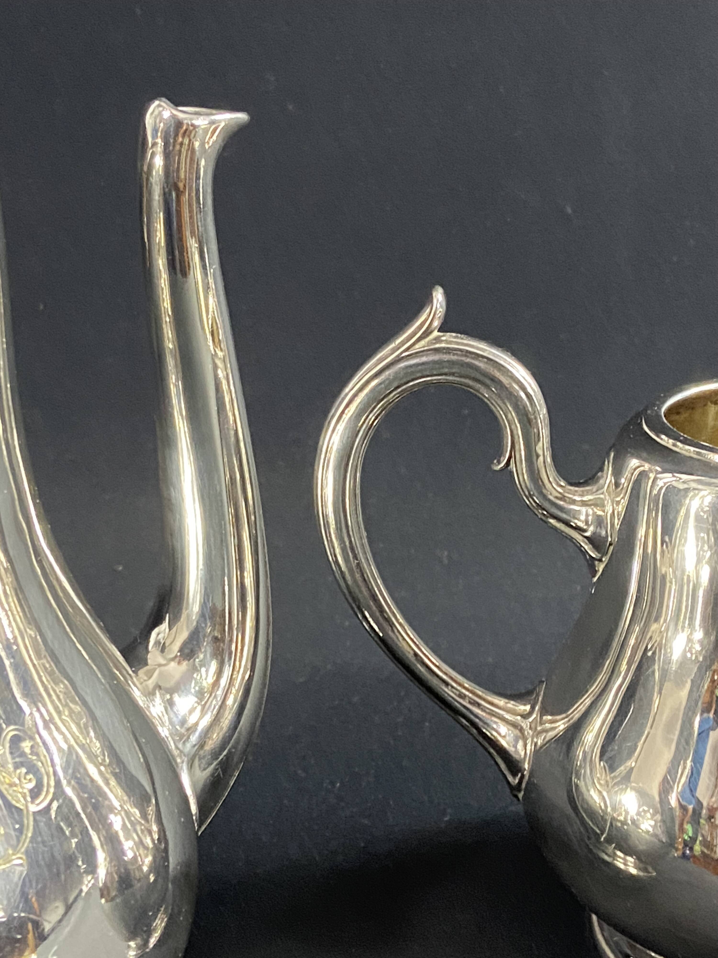 Silver-plated coffee pot and milk jug monogrammed MA, signed CHRISTOFLE.