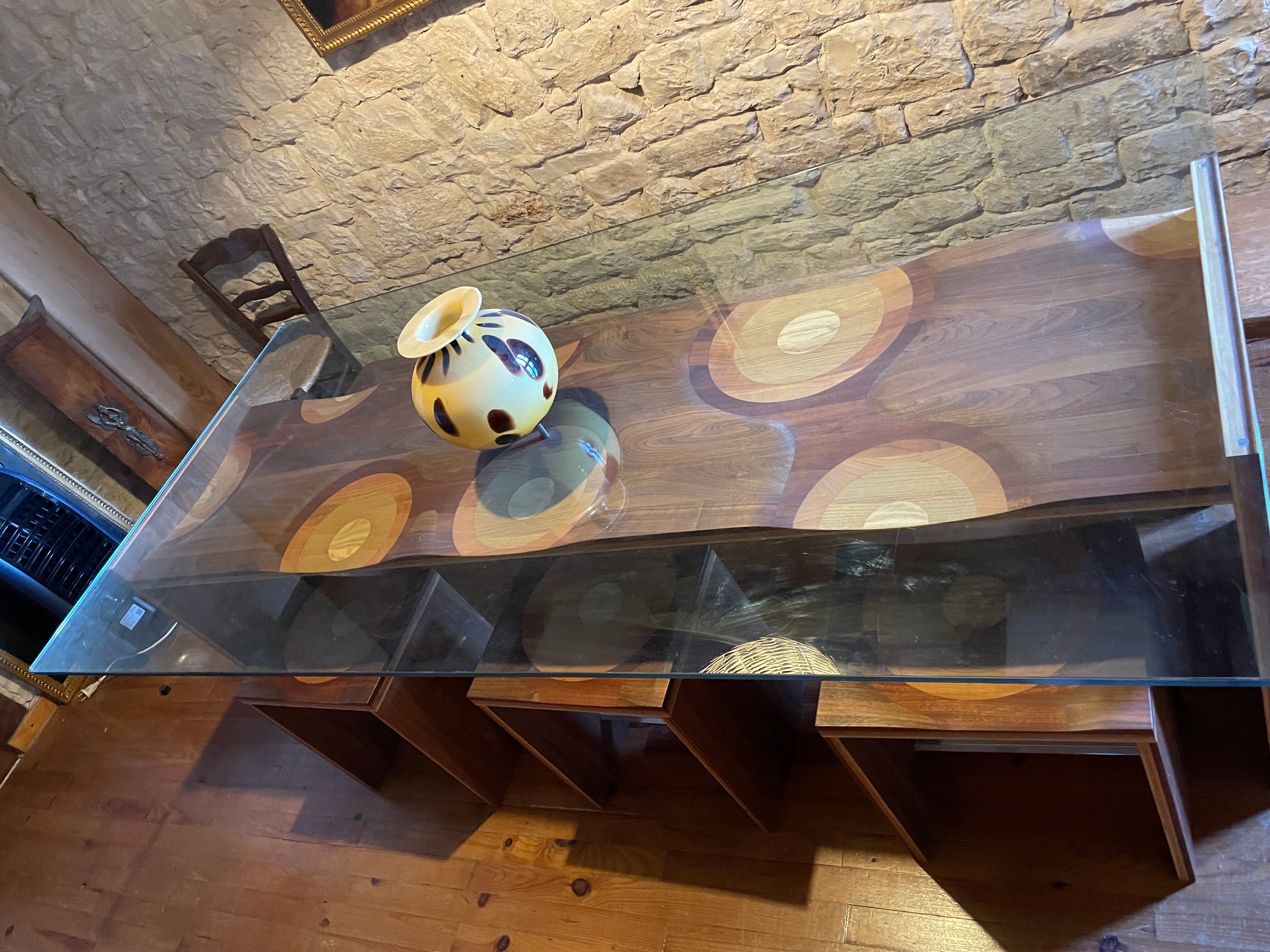 Dining table and 3 Ripples stools by Toyo Ito.