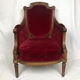 Bergère de style louis xvi garnie de velours rouge sombre, début xixe