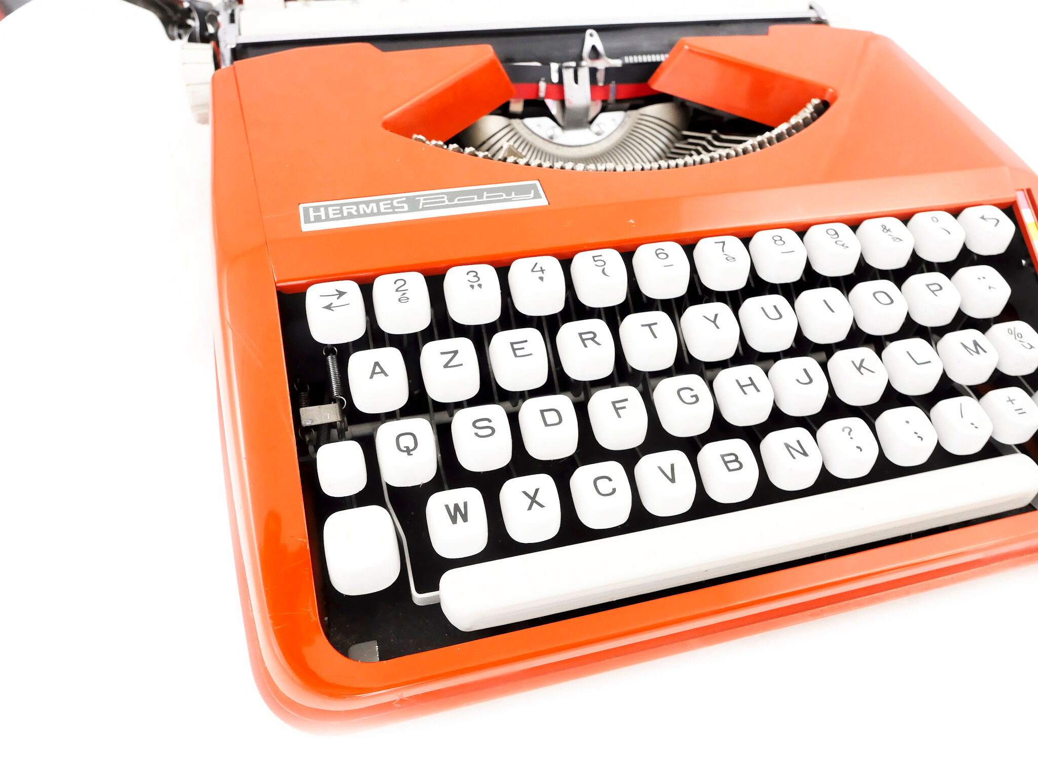 Machine à écrire hermes baby rouge corail cursive