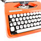 Machine à écrire hermes baby rouge corail cursive