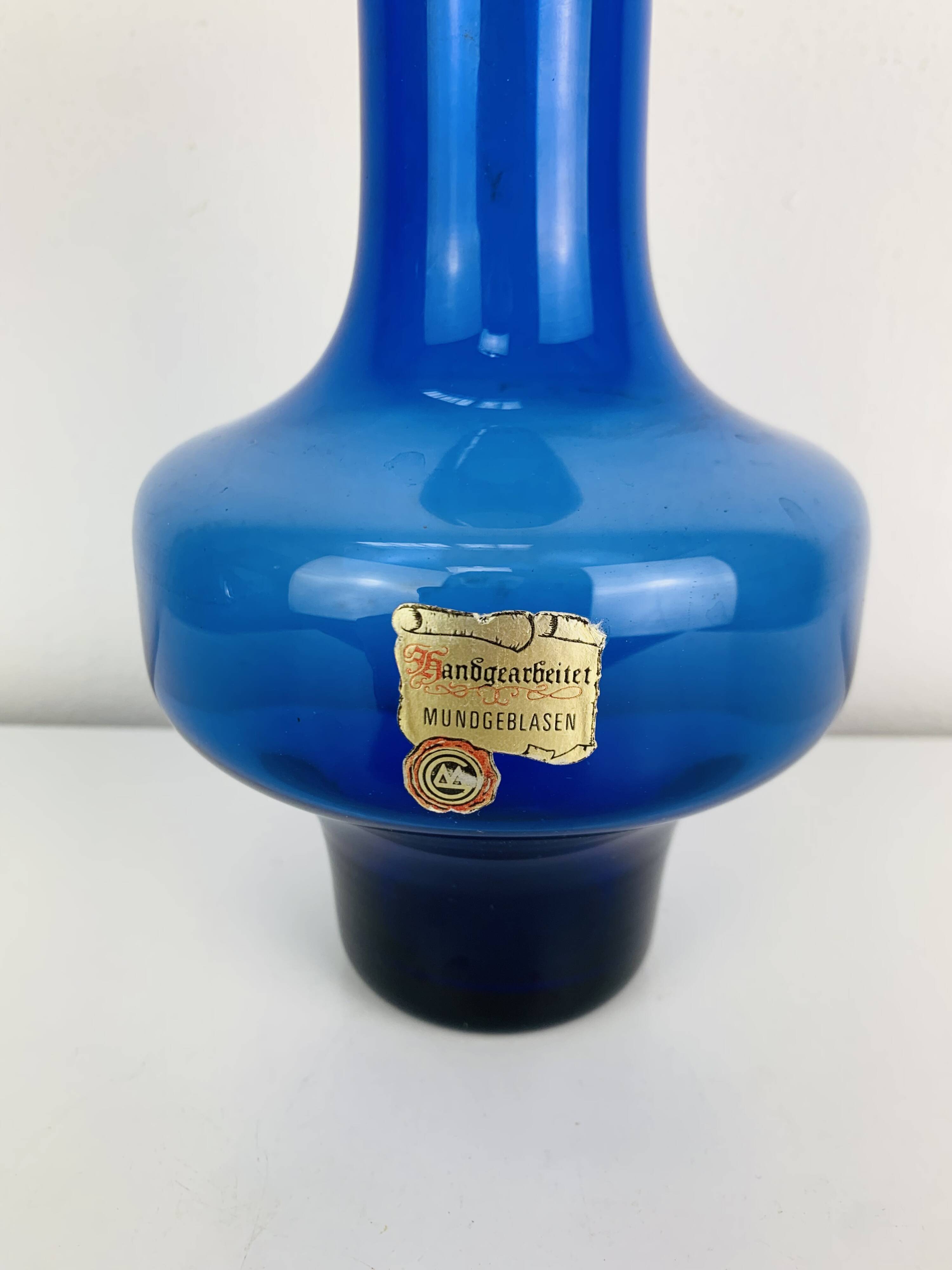 Blue glass vase in Scandinavian style from the 1960s, mouth-blown.