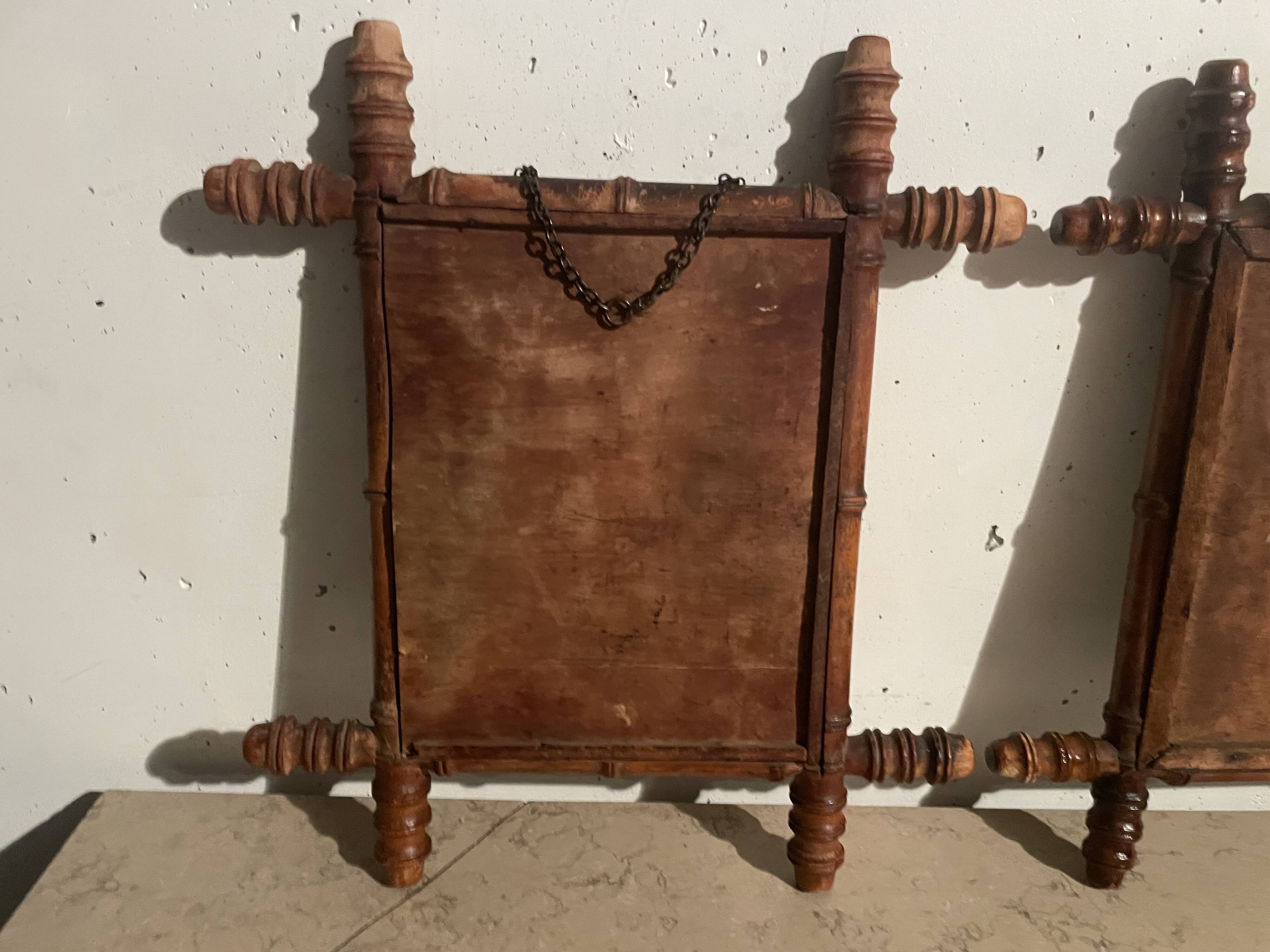 Pair of wooden mirrors from the 1940s.