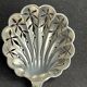Cake tongs and spoon to sprinkle silver metal