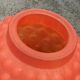 Small Art Deco ball vase in red-orange tinted glass