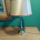 Silver metal lamp with its lampshade