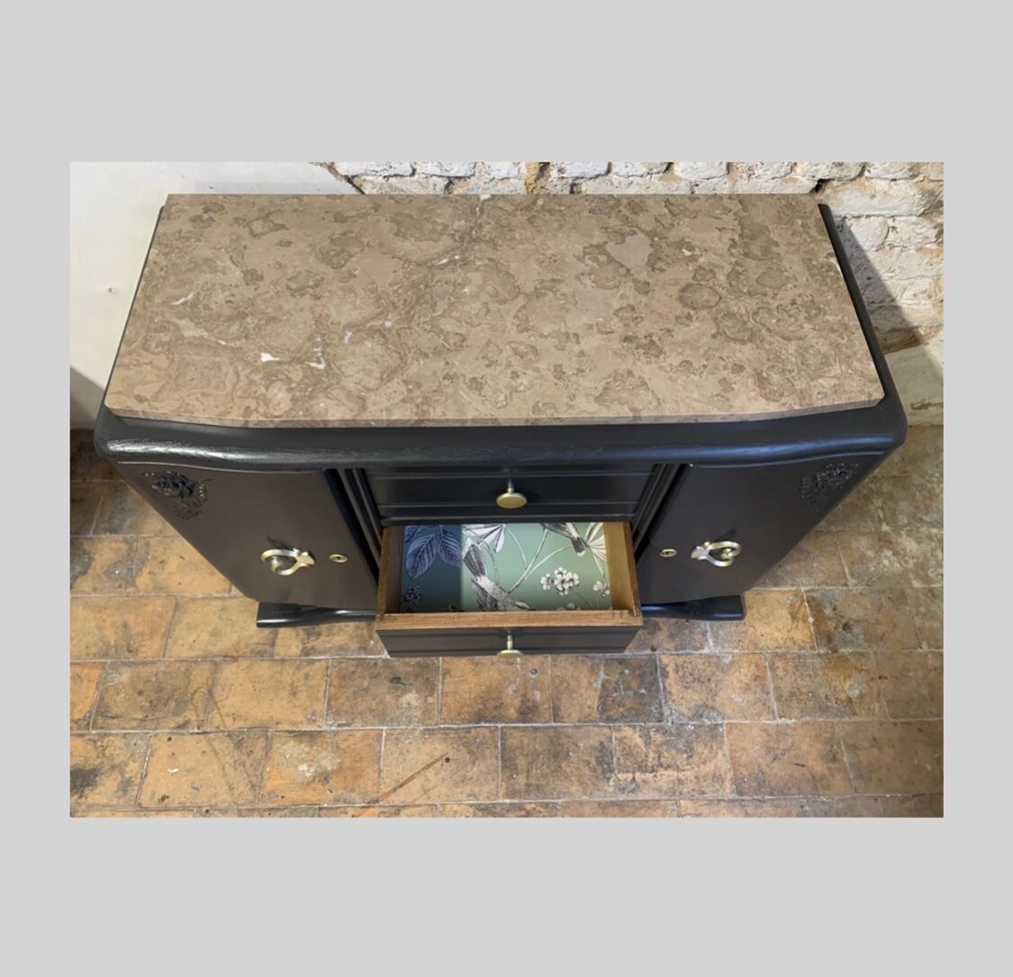 Black art deco sideboard and grey marble