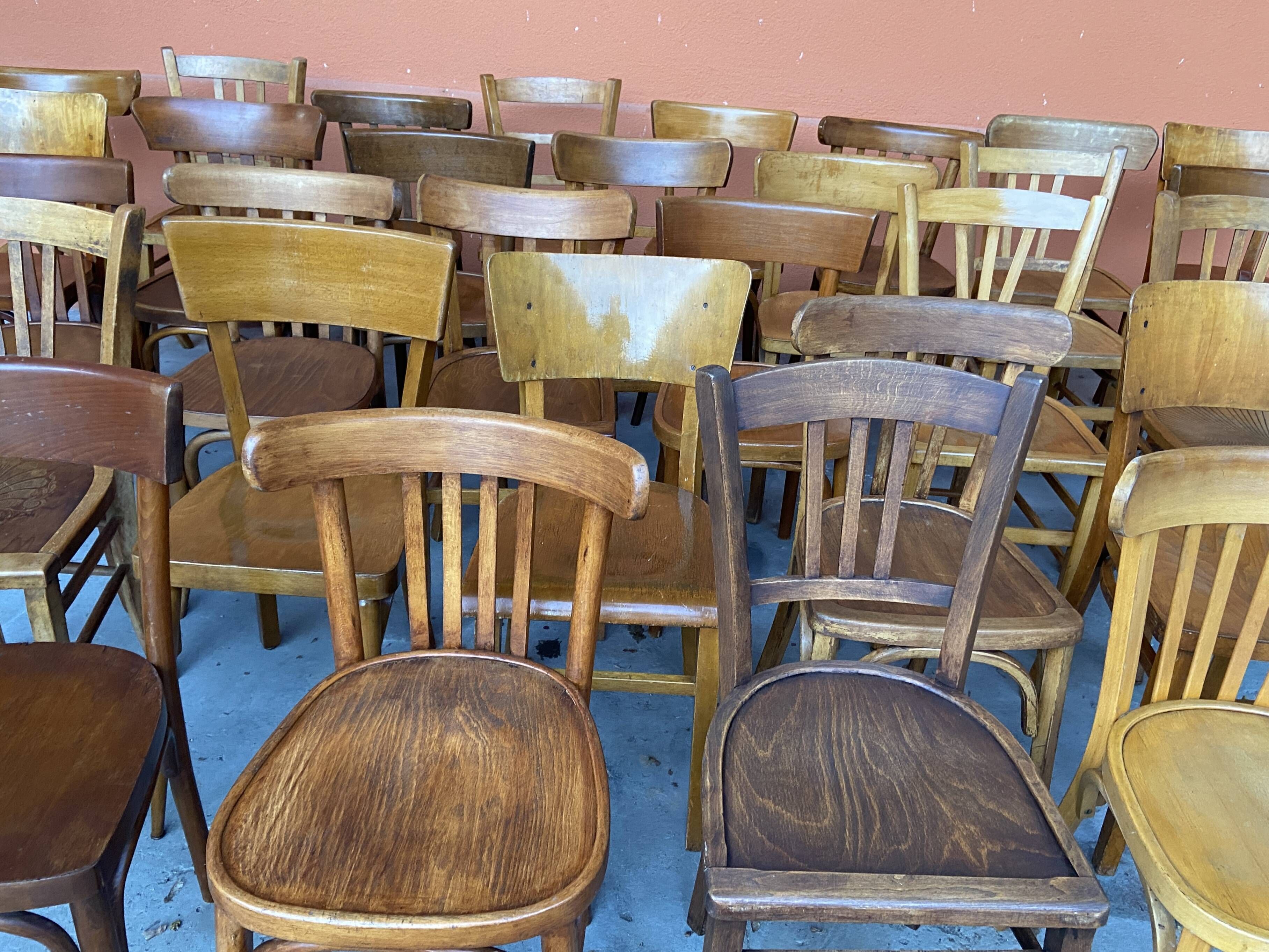 Set of 30 mismatched bistro chairs French Restaurant curved wood