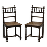 Pair of wooden caned chairs