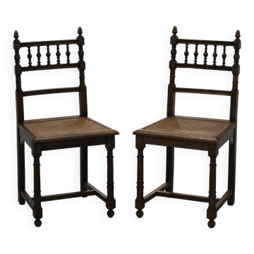 Pair of wooden caned chairs