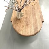 XXL oval coffee table in solid oak, cylindrical base, 1950s.