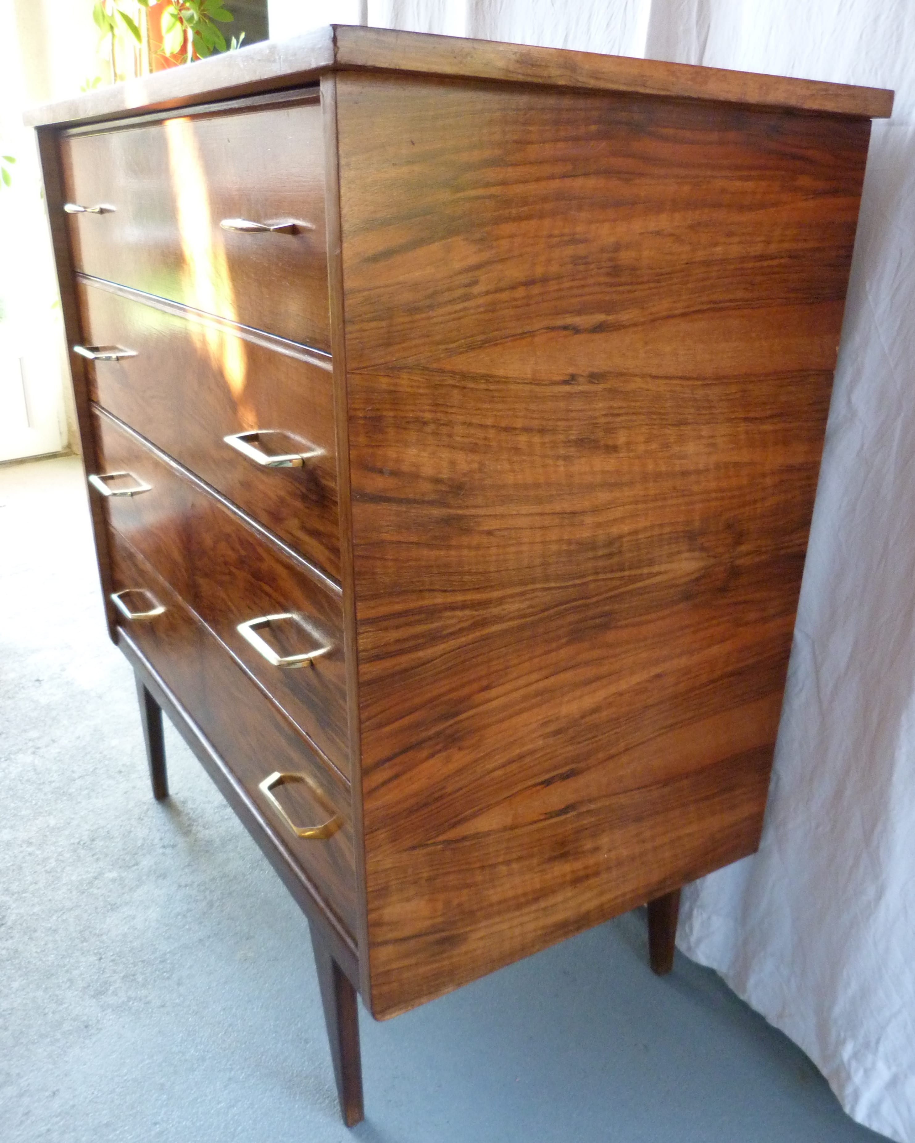 Compass feet chest of drawers