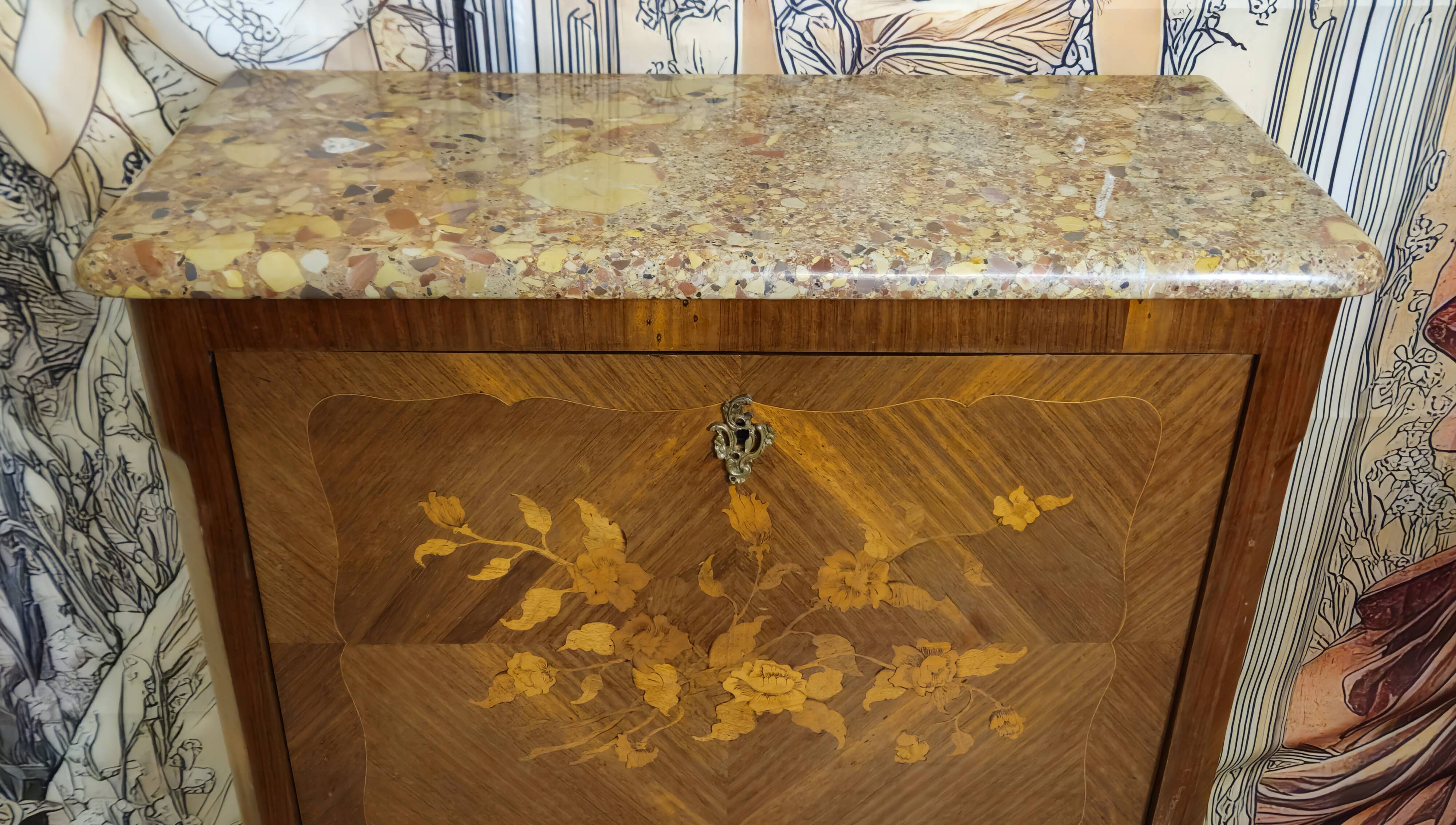 Secretary with a curved drop-leaf in floral marquetry, mid-19th century.