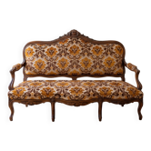Two-seater banquette canapé in Louis XV style, made of wood and fabric.
