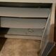 Antique vintage two-door sideboard in cloud gray