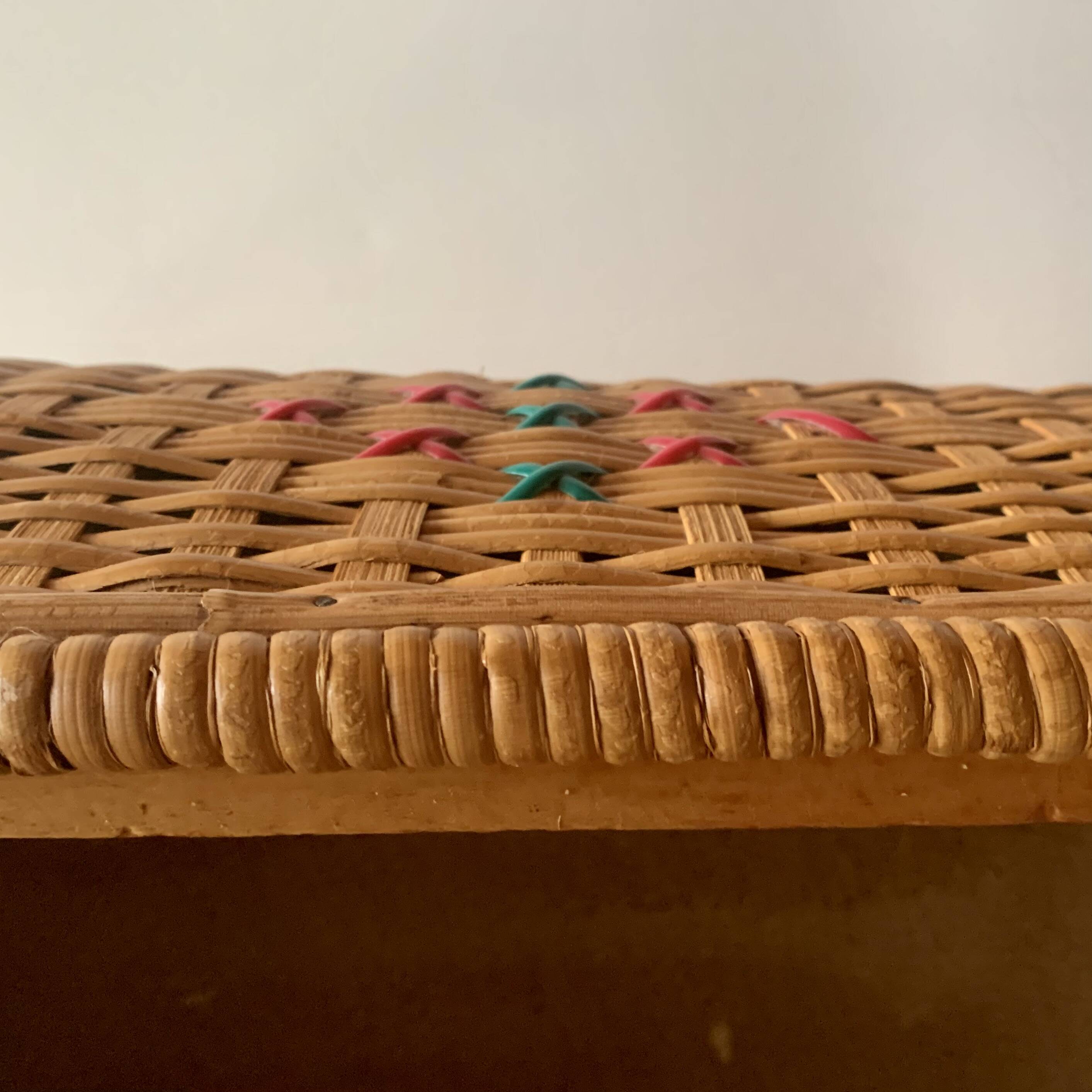 Large vintage rattan and wicker sewing basket with floral decor seat