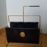 Modernist magazine rack in the style of Jacques Adnet