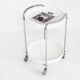 Vintage side table on casters. Chrome-plated iron and plastic. France, 1970s