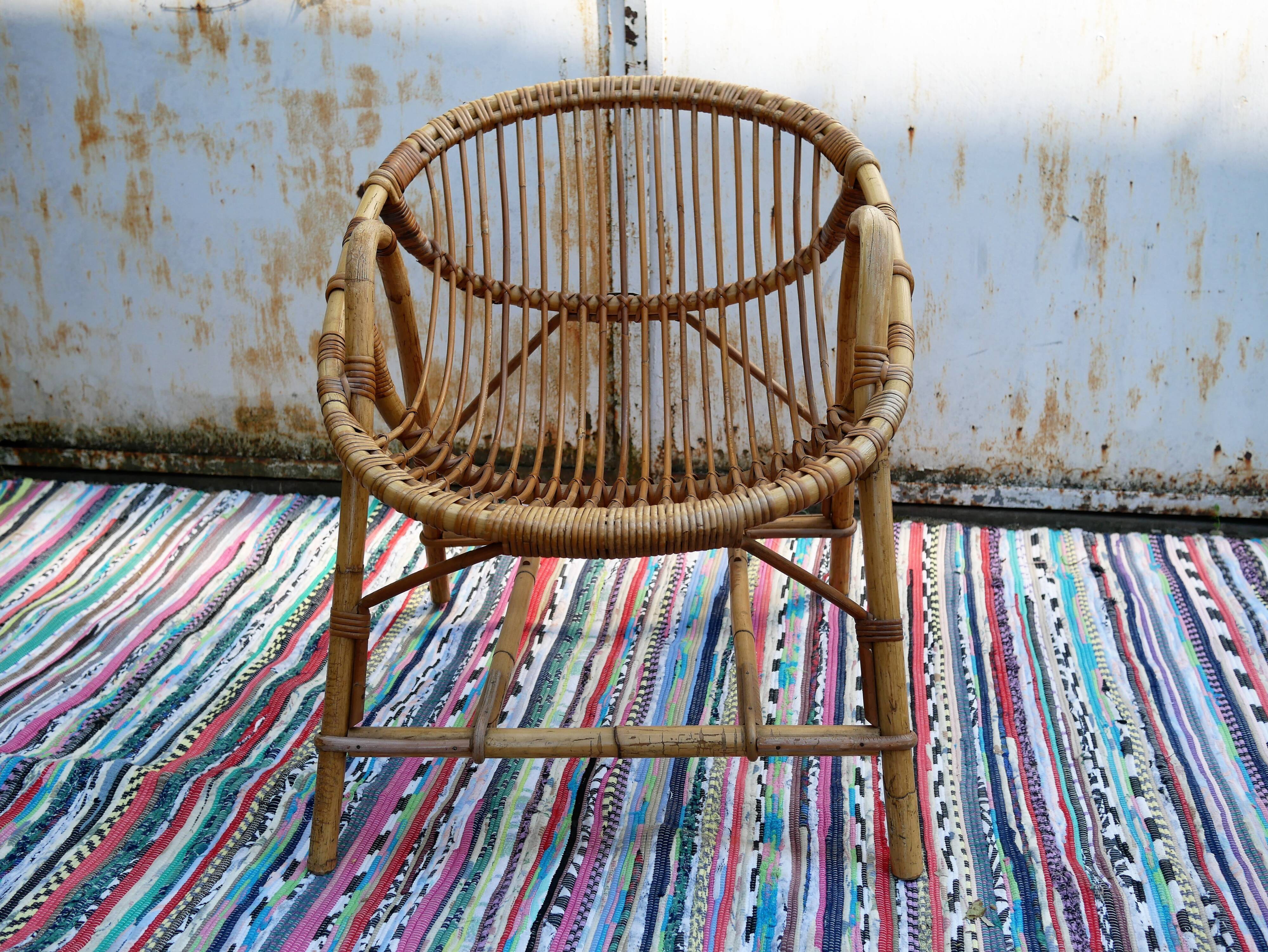 Vintage rattan "shell" armchair