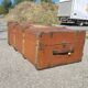 Old travel trunk made of wood and brass