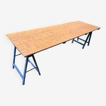 Farm wooden tavern table on trestles