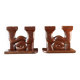 Pair of Art Deco carved wood candlesticks, signed Delaporte