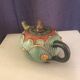 Cloisonnée tea in the shape of lotus flower