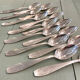 Series of 14 Art Deco dessert spoons, silver metal