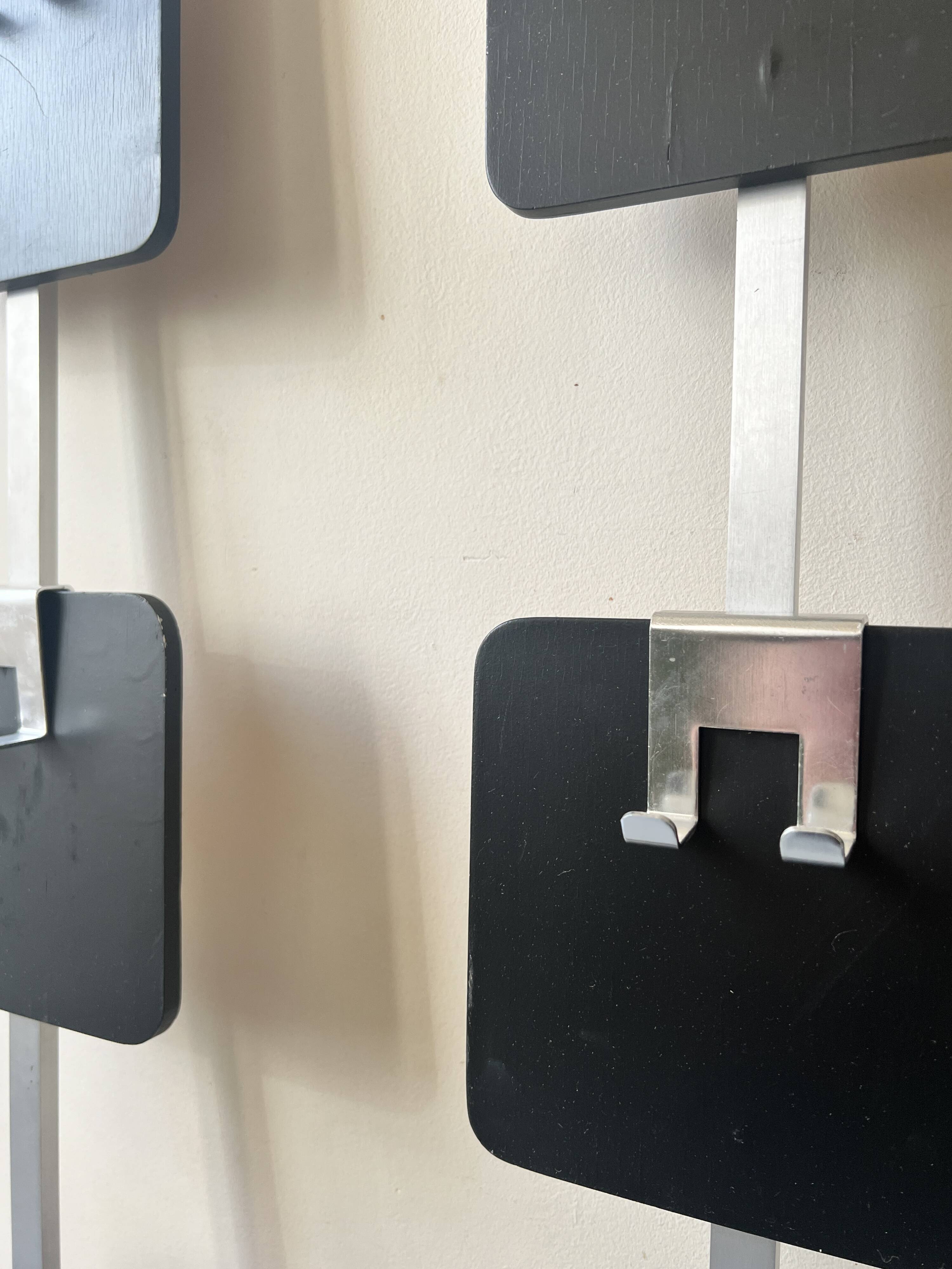 Large modernist wall coat rack in wood and metal, 1970s design.