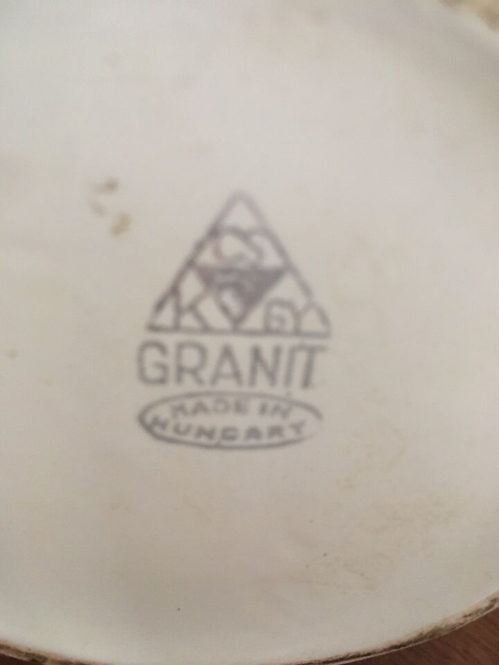 Vintage pitcher with apple decoration.