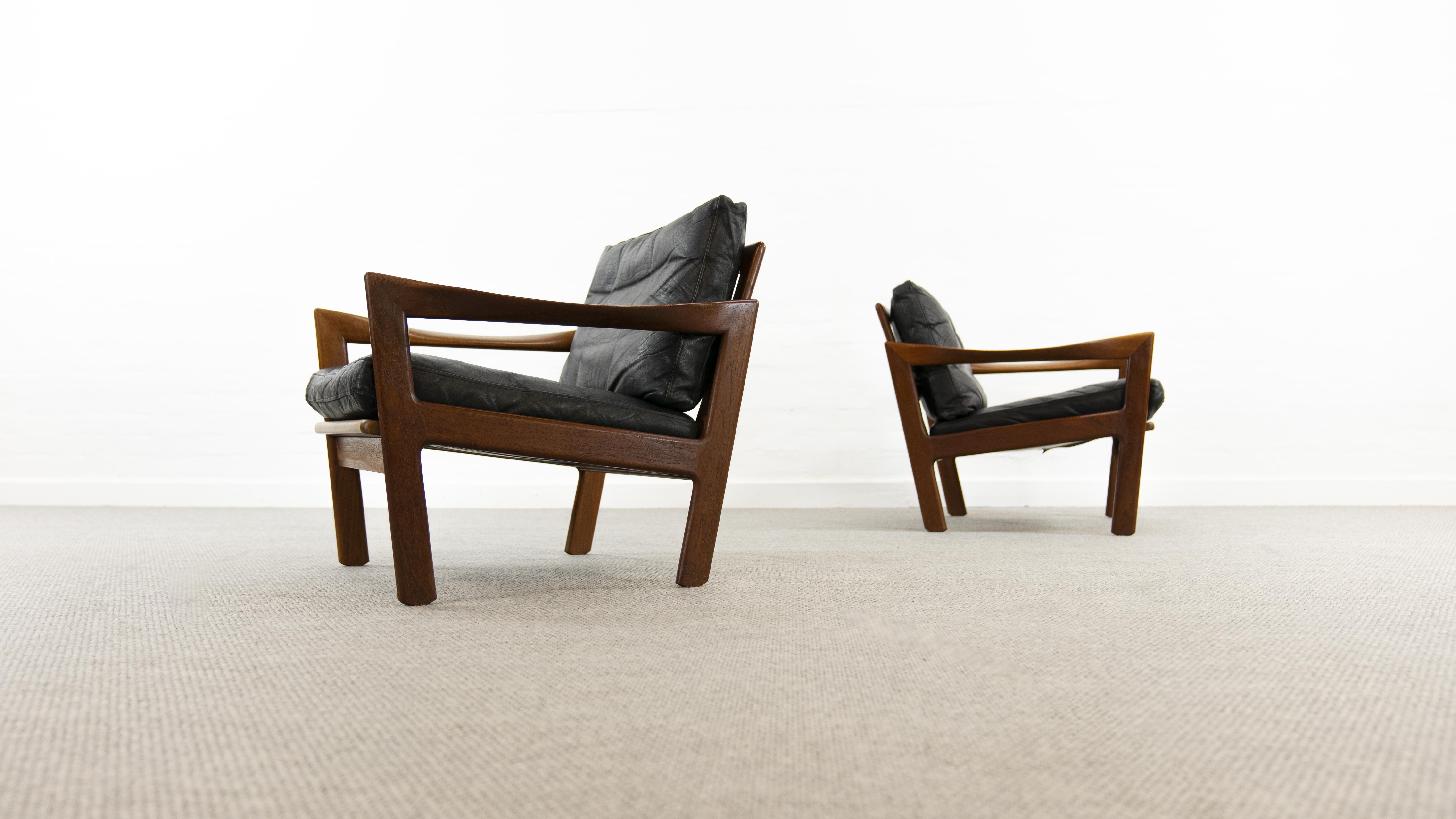 Pair of teak chairs in black leather by Illum Wikkelsoe for Niels Eilersen, Denmark