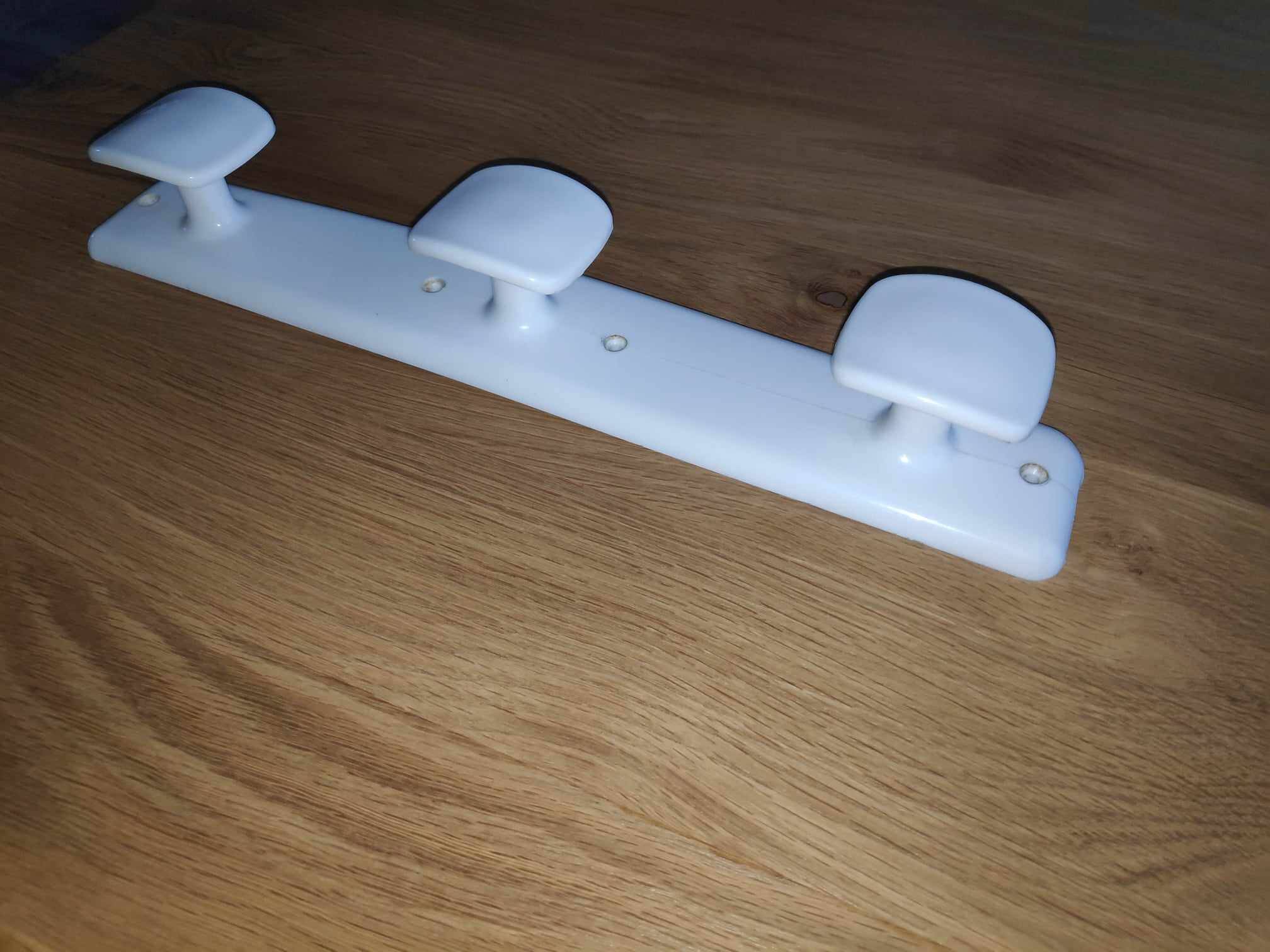 Vintage white plastic coat rack