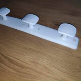 Vintage white plastic coat rack
