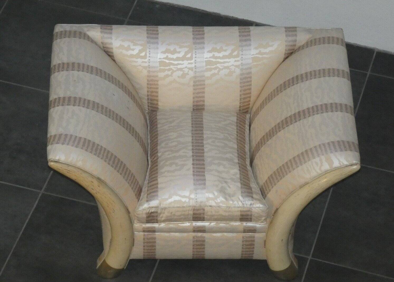 Sofa and armchair in colonial style with saber legs in resin, Italy, 1970s.