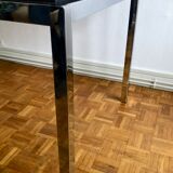 Glass and chrome metal dining table