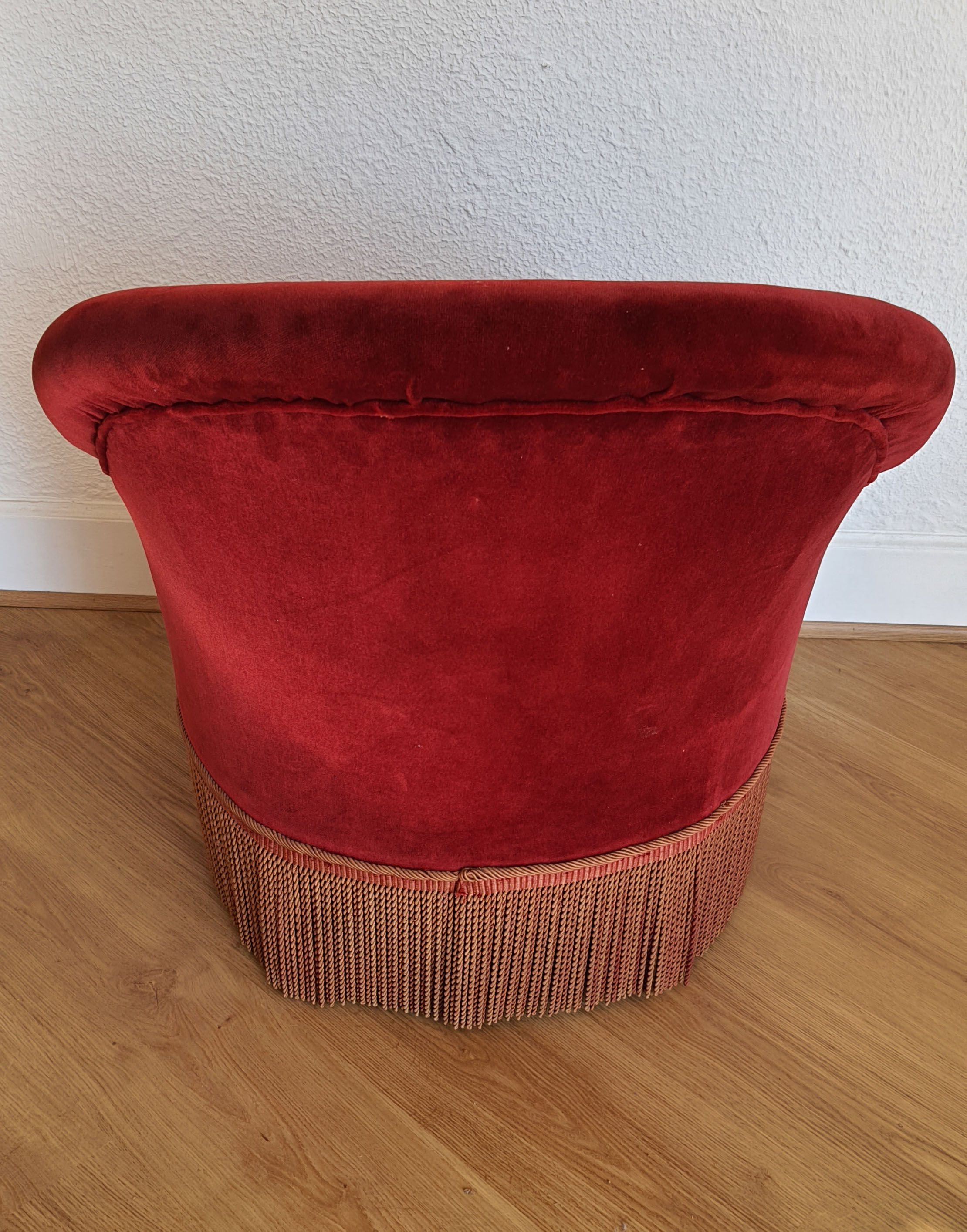 Fauteuil crapaud en velours rouge