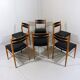 Set of 6 dining chairs in beech & black leather 1960’s